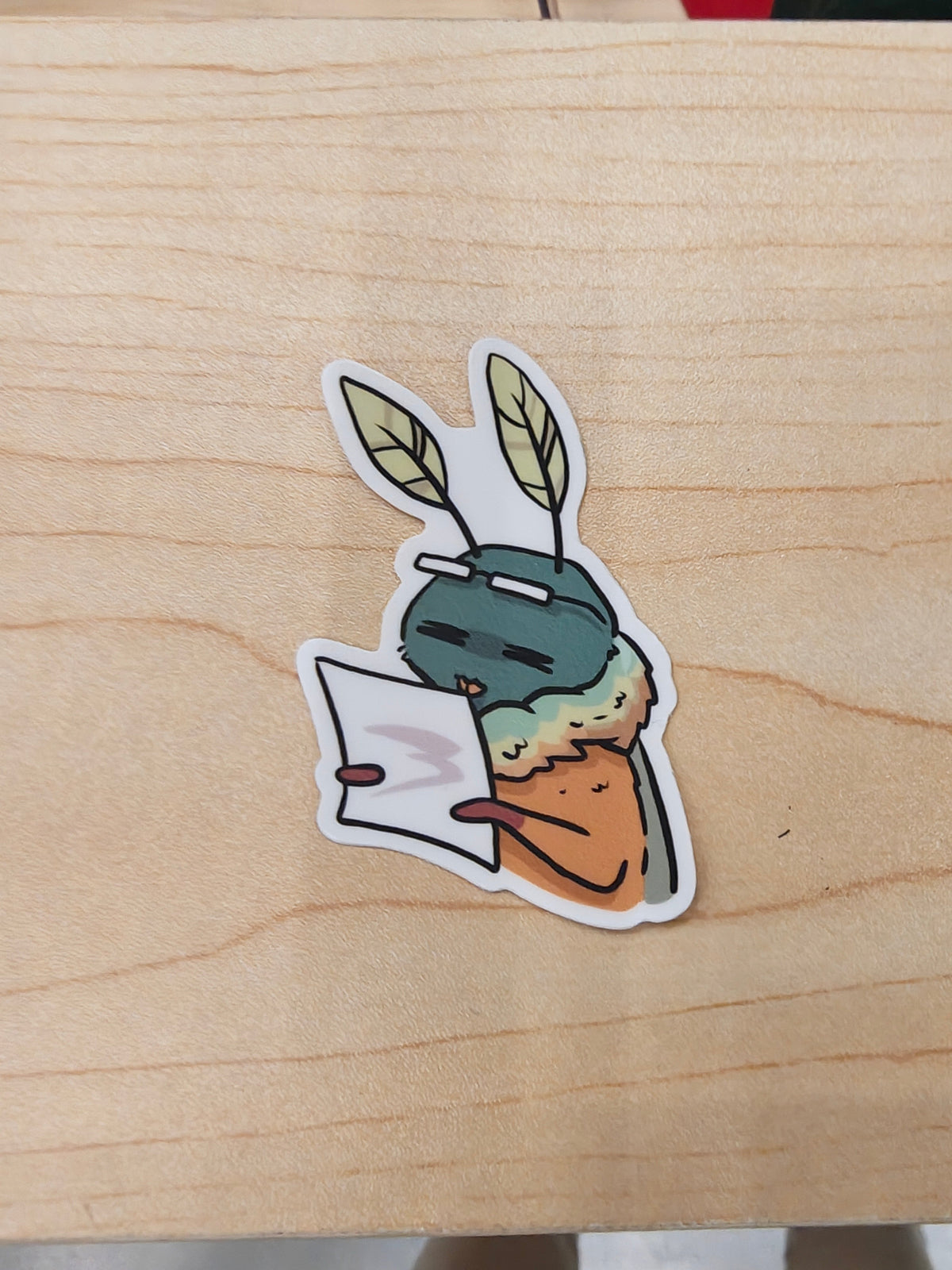Reading Moth die-cut vinyl sticker