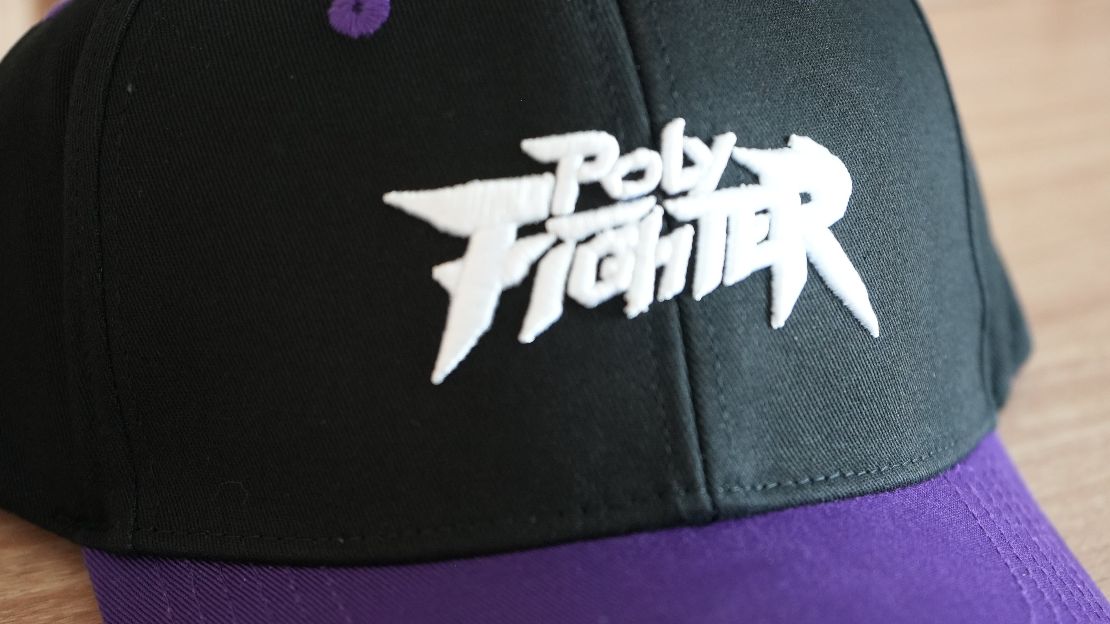 Poly Fighter x SHIDŌ FlexFit Cap — Purple (Under-Brim Roster Art)
